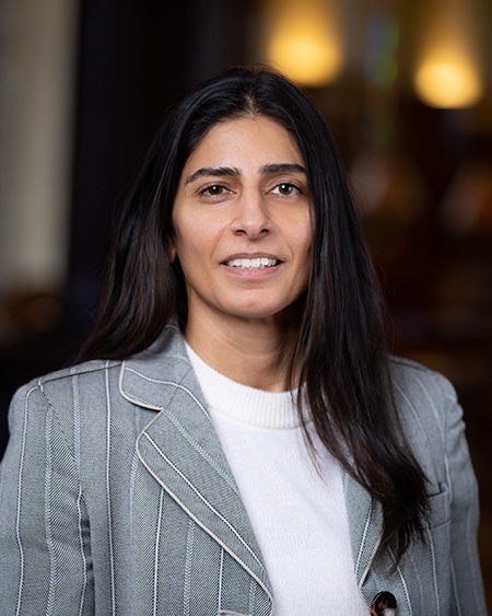 Headshot of Alisha Adatia.