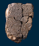 Imago Dei, the world's oldest map, a very old rock with writing carved into it.