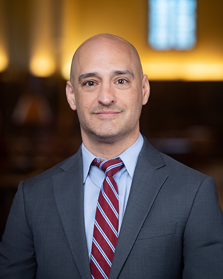 Headshot of Dimitri Millas.