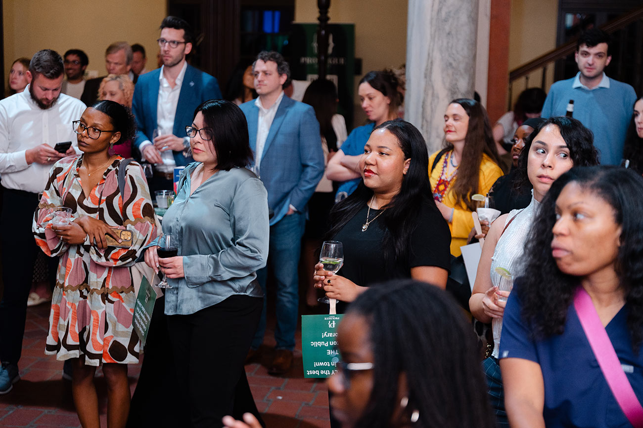 The crowd listening to a speaker at the Prologue Society kickoff event.